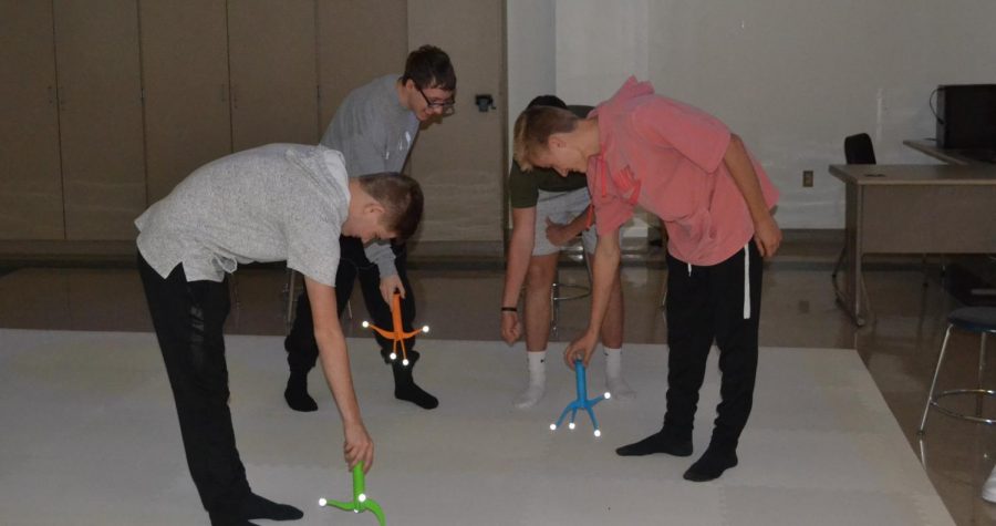 Using wands created by a 3D printer, students participate in a Virtual Lab experience at the high school.