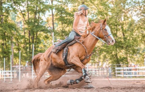 Ava Robinson competes with one of her horses.