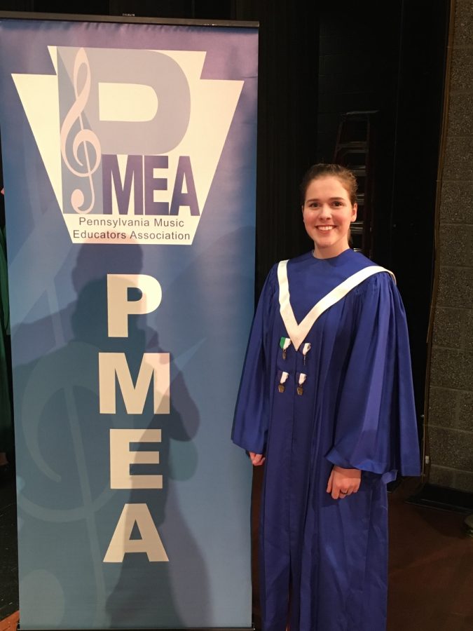 Rachel+stands+happily+next+to+the+PMEA+sign+after+placing+2nd+overall+out+of+the+whole+District%21+Great+job+Rachel%21