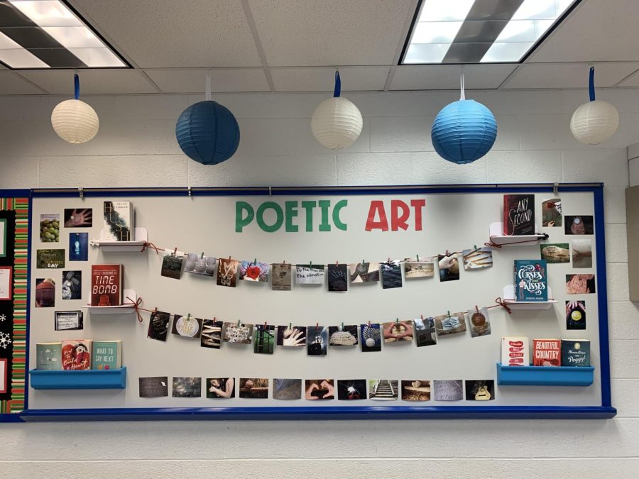 Many of the decorative pictures hung up are from a poetic assignment Shaw gives to her English 10 classes. Shaw also adds books on the sides, which perfectly compliment the rest of her display.