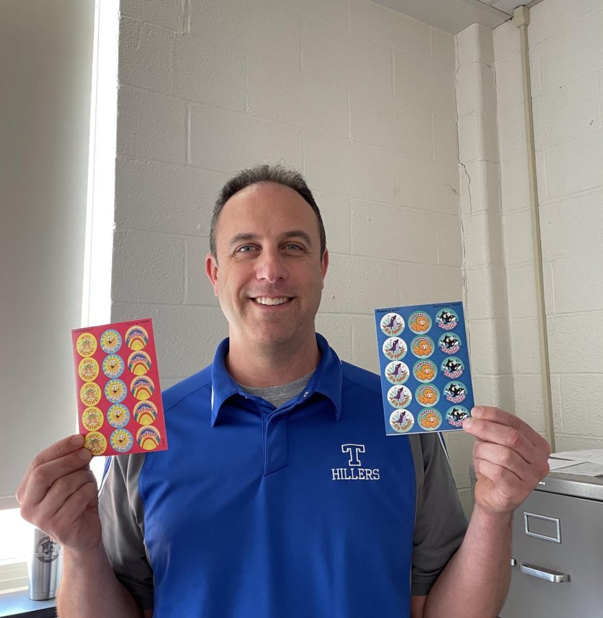 Skroupa excitedly shows off his glorious, high quality scratch and sniff stickers while in his classroom. That heavenly smile will brighten up anyones day!
