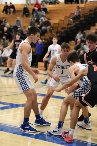 Junior Owen Wayman and Senior Connor Roberts putting up a hard fight against the Bethel Park Hawks.  
