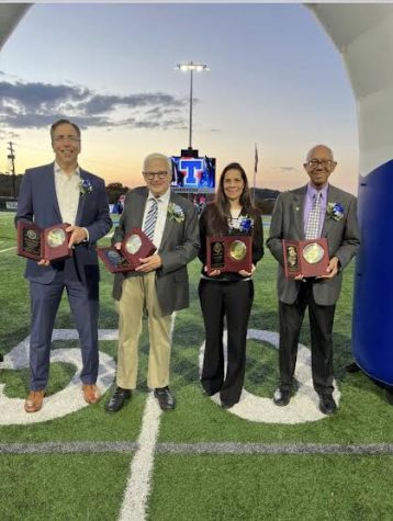 Dr. Faust, Edward Romanoff, Dr. Gardner and Dr. Goudy (L-R) receive their plaques for the Hiller Hall of Fame on October 14, 2022.
