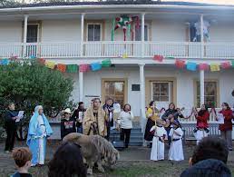 Latin American families go door to door seeking shelter acting as Jesus, Mary and Joseph during Las Posadas singing carols and connecting with their community.