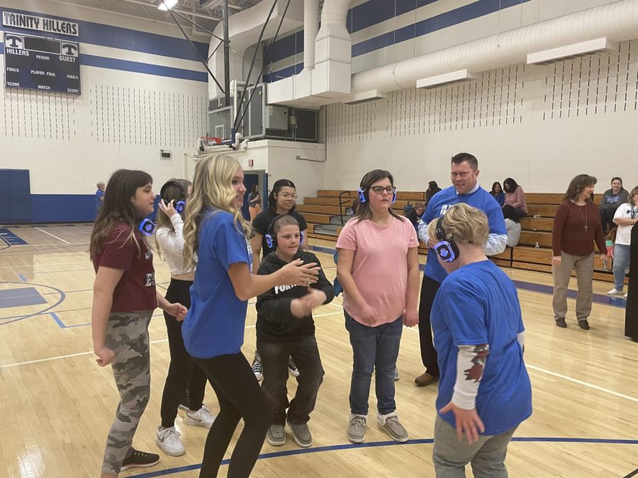 Unlike a “regular” school dance, a silent disco allows participants to tailor their song choices to their preferences. This can be an easier setup than the traditional setting for individuals with sensory difficulties as it creates a fun and customized  experience for each participant.