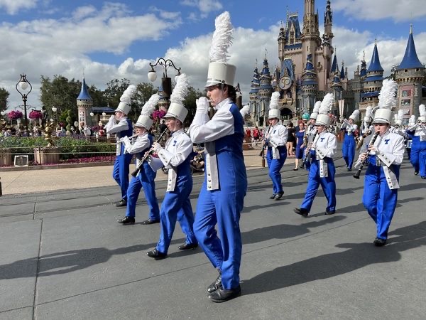 The Trinity band marches in front of the Cinderella castle in Magic Kingdom. Getting to perform at a theme park in Disney gives the band a chance to perform on a grand stage in front of many “magical” people. 