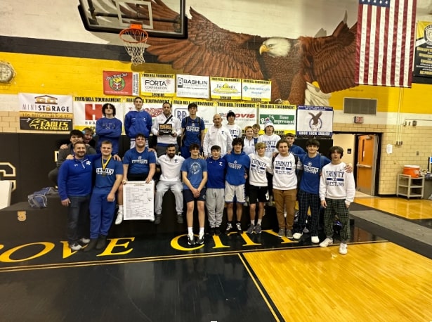 The boys’ wrestlers capture a team picture after defeating Grove City High School. 
