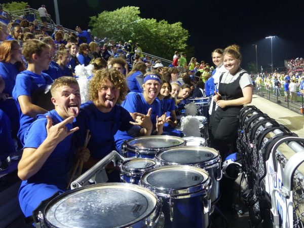 Pictured here is the band’s drumline and Drum Majors Arwen Ikach and Nathan Sander. The members of the drumline are very close and are always very energetic during Friday night football games. This picture was taken during Trinity’s game against Peters High School.
