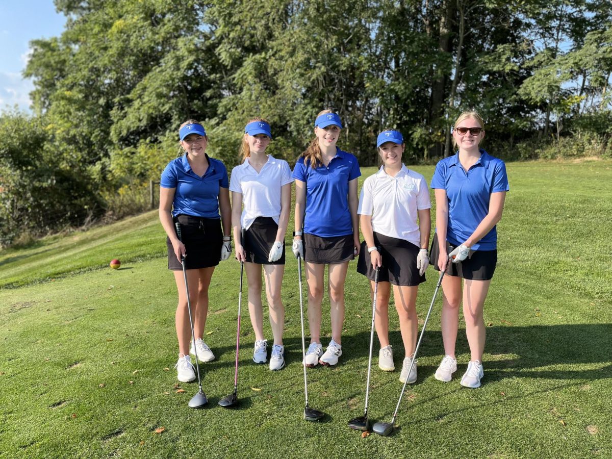 Trinity High School’s girls’ golf team members, left to right, Natalie Ewbank, Madison Miller, Autumn Sitler, Giana Sasselli, and Avery O’Sullivan, are close knit and enjoy playing in matches together, regardless of grades or skill levels.