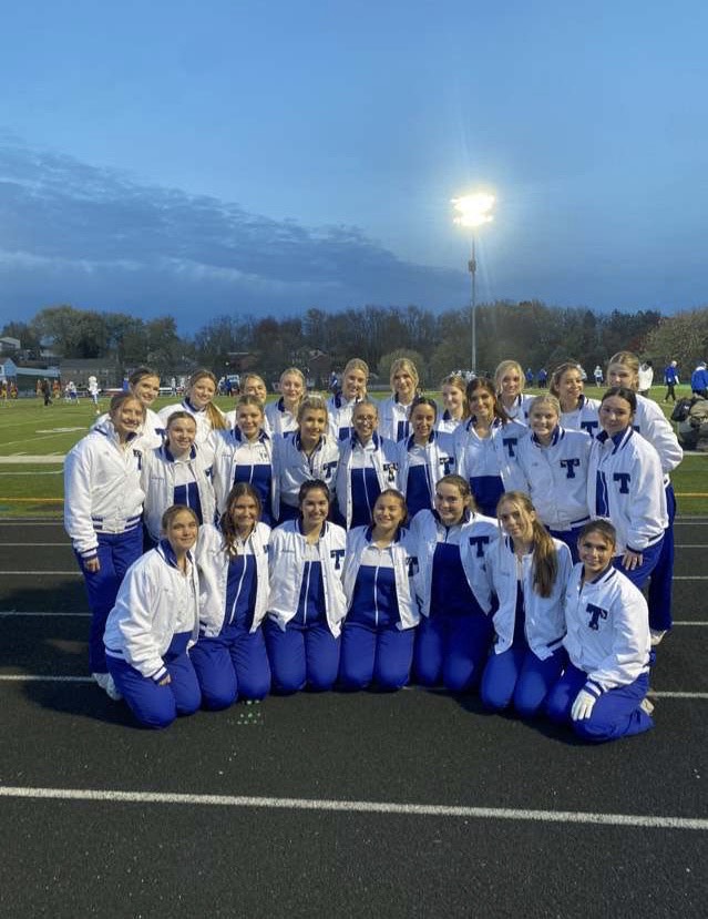 Trinity High School’s varsity cheerleading team poses for a picture after the football team’s 49-0 win against North Catholic on Friday, November 3, 2023.