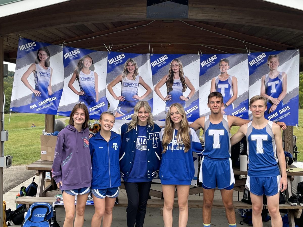 This+years+cross+country+seniors+celebrate+an+amazing+season%21+Ava+Campman%2C+Kaylee+Foringer%2C+Maria+Giorgi%2C+Timberly+Gardner%2C+Ben+Papson+and+Noah+Davis+pose+in+front+of+their+senior+banners.+