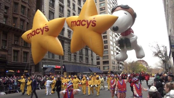 Pictured is a giant Snoopy balloon and two Macy’s balloons being transported down 34th Street during the parade in 2010.
