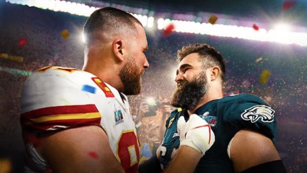 Travis (left) and Jason Kelce (right) share a hug after the Kansas City Chiefs Superbowl win in 2023. 
