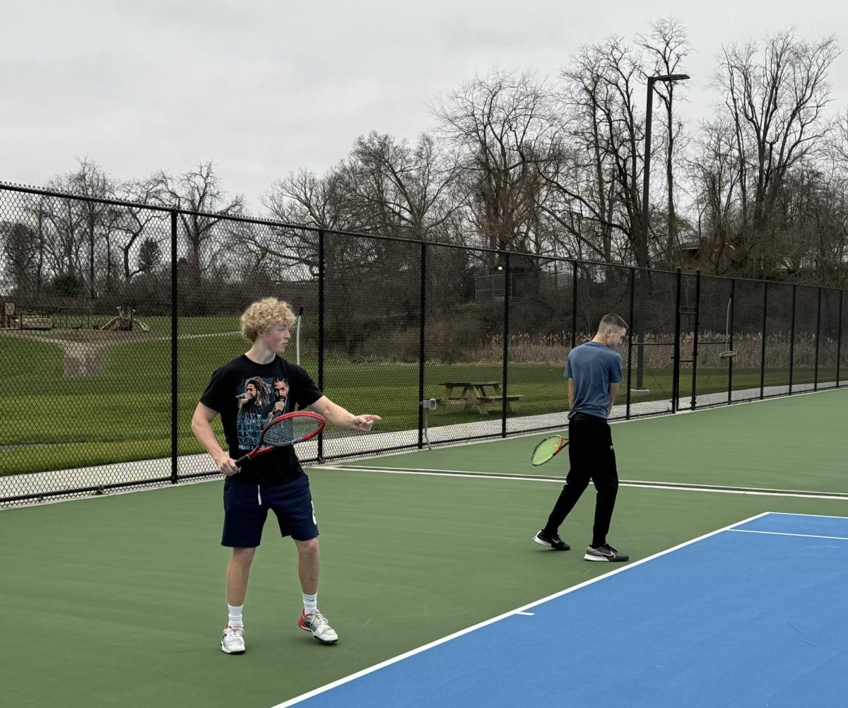 The+boys+are+busy+preparing+for+a+successful+season+of+tennis.+Senior+captain+Ethan+Clawson+and+Sophomore+Everett+Luzar+engage+in+a+riveting+match+against+tough+competitors.+Be+sure+to+come+watch+their+next+home+match+on+April+2+at+Trinity+West.