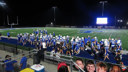 Pictured above is the Trinity Hillers football team at their winning game against McGuffey on August 30, 2024. Roll Hillers!