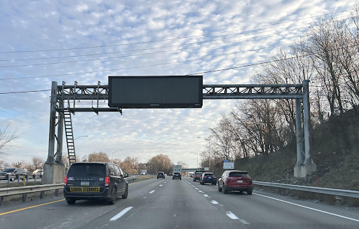 While riding in the passenger seat on a cold December morning, Maggie snapped this picture. Roads tend to be busy on commutes to work and school. Navigating traffic, especially on slippery roads, can be particularly difficult, especially for younger, inexperienced drivers. It’s important to stay focused and pay attention to the cars driving by. 