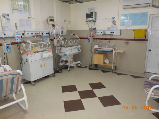 NICU babies often spend their time in the hospital in incubators in order to simulate growth and development. They are often hooked up to various tubes and wires to monitor the infant's health. 