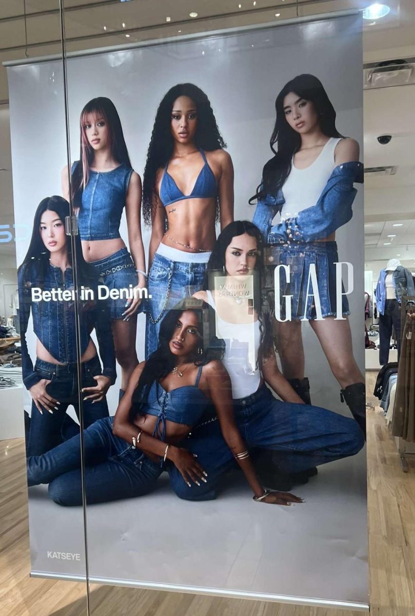 The GAP’s collaboration with Katseye is pictured outside The GAP store at Ross Park Mall. Their partnership is displayed throughout the store in various ways, including a video of the advertisement playing. 
