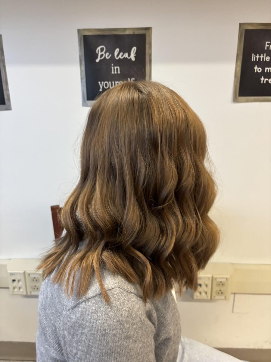 Kitsko shows off her recent decision to get a fall chop, curled and styled. Her personal preference and gravitation toward shoulder-length bobs is what she believes is the perfect length for a bob. 

