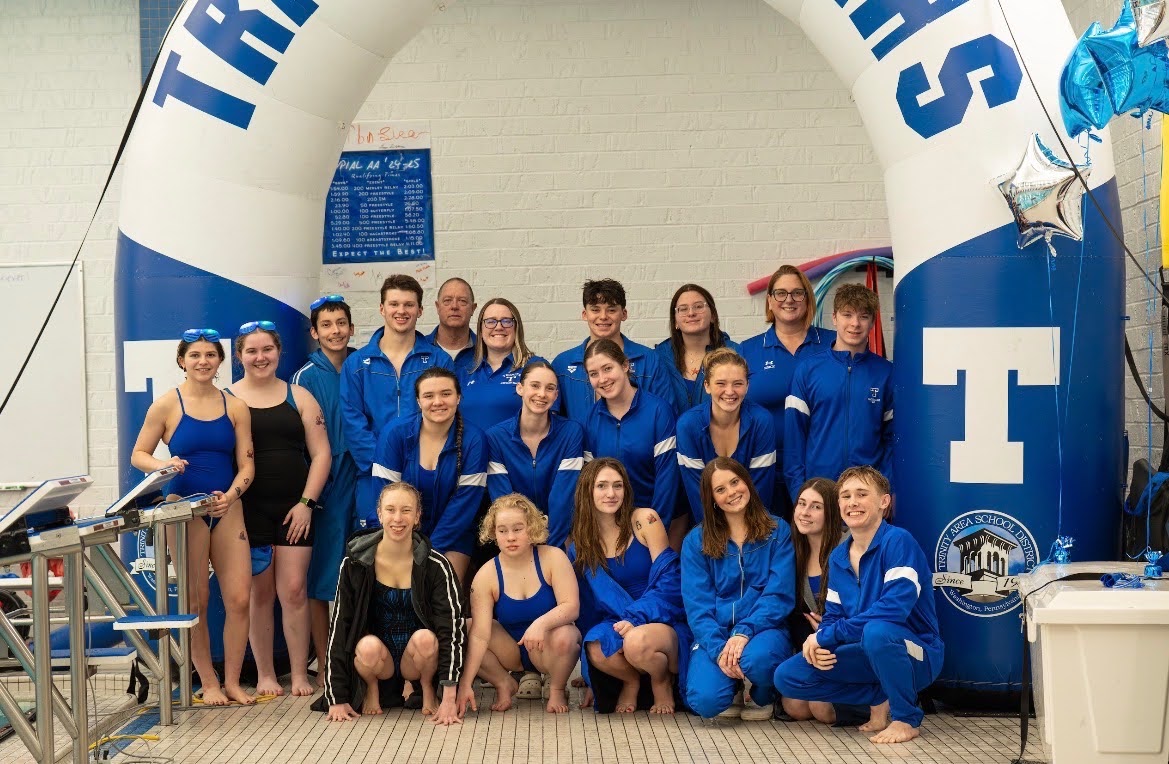 The Hillers pose for a picture before their Senior Night meet against Uniontown. The girls won this matchup while the boys took a hard fought loss.