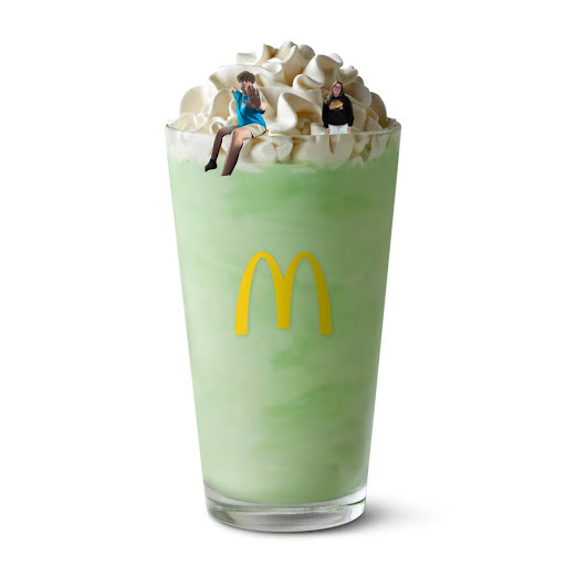 Arts & Entertainment Editor Katherine Drezewski and Staff Writer John Bunner cool down on the edge of a Shamrock Shake.