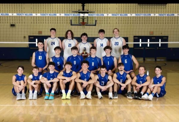 The Trinity Boys' Volleyball team poses for a picture on media day. From top left, Husman, Bryant, Pugh, Bailes, McMullen, Raleigh Flickinger, Ayceton Lloyd, Brody Knight, Brady Anderson, Lent, Muncie, Liam Flickinger, Noah Jahn, Liam Miller, Evan Slagle, Roger Li, Gino Lesako, Aaron Armstrong, Jacob Stedman and Gabriel Flickinger.